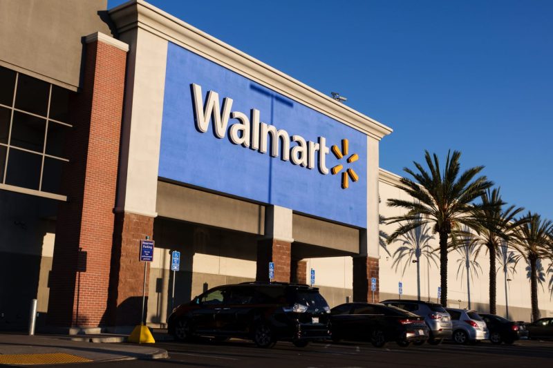Walmart on Thursday raised its full-year earnings and sales outlook as its online business posted another quarter of double-digit gains, even as the company said costs are rising from higher tariffs. 
The big-box retailer topped Wall Street’s quarterly sales estimates but fell short of earnings expectations, the first time it missed on quarterly earnings since May 2022. The company said it felt pressure on profits for the period, including from some one-time expenses, such as restructuring costs, pricier insurance claims and litigation settlements.
Walmart said it now expects net sales to grow 3.75% to 4.75% for the fiscal year, up from its previous expectations of 3% to 4%. It raised its adjusted earnings per share outlook slightly to $2.52 to $2.62, up from a prior range of $2.50 to $2.60 per share.
In an interview with CNBC, Chief Financial Officer John David Rainey said the company is working hard to keep prices low — including speeding up imports from overseas and stepping up the number of Rollbacks, or limited-time discounts, in its stores. 
“This is managed on an item-by-item and category-by-category basis,” he said. “There are certainly areas where we have fully absorbed the impact of higher tariff costs. There are other areas where we’ve had to pass some of those costs along.”
But he added “tariff-impacted costs are continuing to drift upwards.” 
Even so, Rainey said Walmart hasn’t seen a change in customer spending. For example, sales of private label items, which typically cost less than national brands, were roughly flat year over year, he said.
“Everyone is looking to see if there are any creaks in the armor or anything that’s happening with the consumer, but it’s been very consistent,” he said. “They continue to be very resilient.”
Yet on the company’s earnings call, CEO Doug McMillon said middle- and lower-income households have been more sensitive to tariff-related price increases, particularly in discretionary categories.
“We see a corresponding moderation in units at the item level as customers switch to other items, or in some cases, categories,” he said.
Here’s what the big-box reported for the fiscal second quarter compared with what Wall Street expected, according to a survey of analysts by LSEG:
Walmart shares fell about 2% in premarket trading Thursday.
Walmart’s net income jumped to $7.03 billion, or 88 cents per share, in the three-month period that ended July 31, compared with $4.50 billion, or 56 cents per share, in the year-ago quarter. 
Revenue rose from $169.34 billion in the year-ago quarter. 
Comparable sales for Walmart U.S. climbed 4.6% in the second quarter, excluding fuel, compared with the year-ago period, as both the grocery and health and wellness category saw strong growth. That was higher than the 4% increase that analysts expected. The industry metric<strong>,</strong> also called same-store sales, includes sales from stores and clubs open for at least a year.
At Sam’s Club, comparable sales jumped 5.9% excluding fuel, higher than the 5.2% that analysts anticipated.
E-commerce sales jumped 25% globally and 26% in the U.S., as both online purchases and advertising grew. In the U.S., Walmart said sales through store-fulfilled delivery of groceries and other items<strong> </strong>grew nearly 50% year over year, with one-third of those orders expedited. The company charges a fee for some of those faster deliveries, and others are included as a benefit of its subscription-based membership program, Walmart+.
Its global advertising business grew 46% year over year, including Vizio, the smart TV maker it acquired for $2.3 billion last year. Its U.S. advertising business, Walmart Connect, grew by 31%.
As Walmart’s online business drums up more revenue from home deliveries, advertising and commissions from sellers on its third-party marketplace, e-commerce has become a profitable business. The company marked a milestone in May — posting its first profitable quarter for its e-commerce business in the U.S. and globally.
Rainey said on Thursday that Walmart doubled its e-commerce profitability in the fiscal second quarter from the prior quarter.
In the U.S., shoppers both visited Walmart more and spent more on those trips during the quarter. Customer transactions rose 1.5% year over year and average ticket increased 3.1% for Walmart’s U.S. business.
As the largest U.S. retailer, Walmart offers a unique window into the financial health of American households. As higher duties have come in fits and starts — with some getting delayed and others going into effect earlier this month — Wall Street has tried to understand how those costs will ripple through the U.S. economy.
Walmart warned in May that it would have to raise some prices due to higher levies on imports, even with its size and scale. The company’s comments drew the ire of President Donald Trump, who said in a social media post that Walmart should “EAT THE TARIFFS.”
About a third of what Walmart sells in the U.S. comes from other parts of the world, with China, Mexico, Canada, Vietnam and India representing its largest markets for imports, Rainey said in May.
According to an analysis by CNBC of about 50 items sold by the retailer, some of those price changes have already hit shelves. Items that rose in price at Walmart over the summer included a frying pan, a pair of jeans and a car seat.
Rainey on Thursday declined to specify items or categories where Walmart had increased prices, saying the company is “trying to keep prices as low as we can.”
He said one of the company’s strategies has been bringing in inventory early, particularly for Sam’s Club as it gets ready for the second half of the fiscal year and its crucial holiday season. At the end of the quarter, inventory was up about 3.5% at Sam’s Club, Rainey said. It was up 2.2% for Walmart U.S.
On the company’s earnings call, McMillon said the impact of tariffs has been “gradual enough that any behavioral adjustments by the customer have been somewhat muted.”
“But as we replenish inventory at post-tariff price levels, we’ve continued to see our costs increase each week, which we expect will continue into the third and fourth quarters,” he said.
Yet even with higher costs from tariffs, Walmart has fared better than its retail competitors as it has leaned into its reputation for value, competed on faster deliveries to customers’ homes and attracted more business from higher-income households.
The Arkansas-based retailer’s performance has diverged sharply from rival Target, which posted another quarter of sales declines on Wednesday and named the new CEO who will be tasked with trying to turn around the company.
Walmart has gained from Target’s struggles. It has followed the Target playbook by launching more exclusive and trend-driven brands, including grocery brand BetterGoods and activewear brand Love & Sports. It has also expanded its third-party marketplace to include prestige beauty brands and more.
Sales of general merchandise, items outside of the grocery department, were a bright spot for Walmart in the fiscal second quarter, Rainey said. That category struggled during peak inflation in recent years, as consumers spent less on discretionary items because of rising grocery bills. 
Comparable sales for general merchandise rose by a low-single-digit percentage and accelerated throughout the quarter, Rainey told CNBC. He added clothing and fashion sales “really shined for us.”
This post appeared first on NBC NEWS
